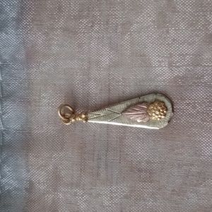 Black Hills Gold 10kt pendant.     Your Purchase Supports Wildlife Rescue!